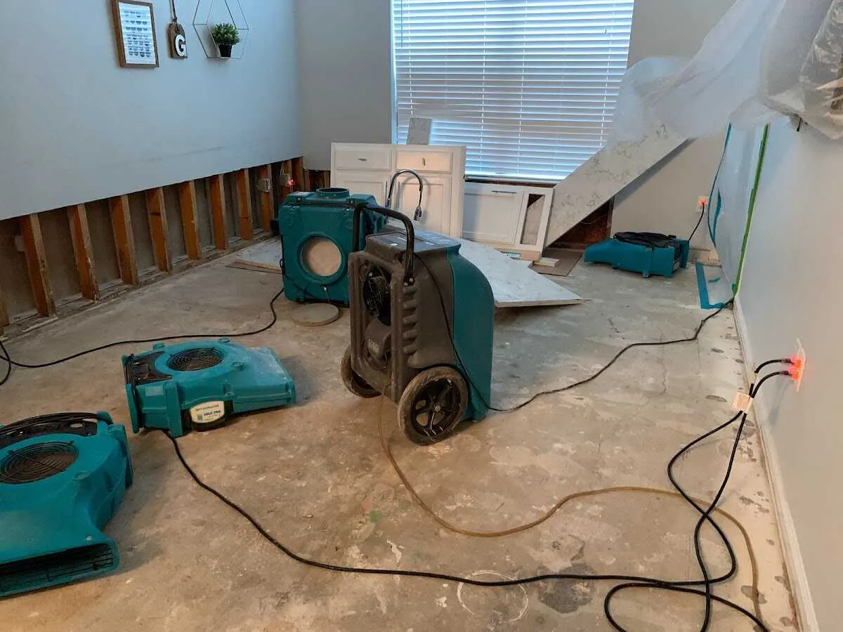 Dehumidifier in flood-cut room for Water Damage Restoration in Douglas